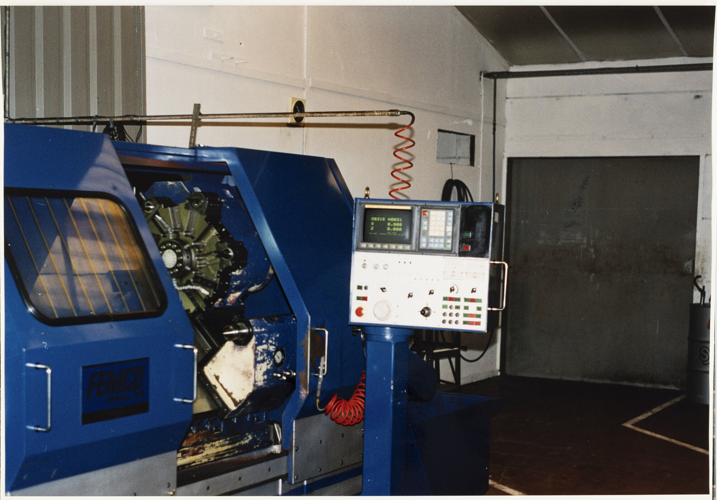 CNC draaibank in machinewerkplaats van Lentz in Gent